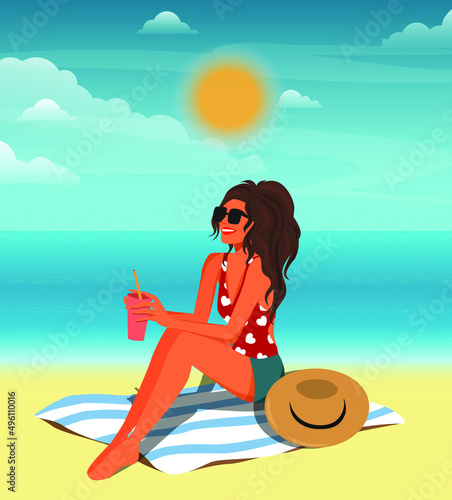 Girl with a cocktail is relaxing sunbathing on the beach on vacation