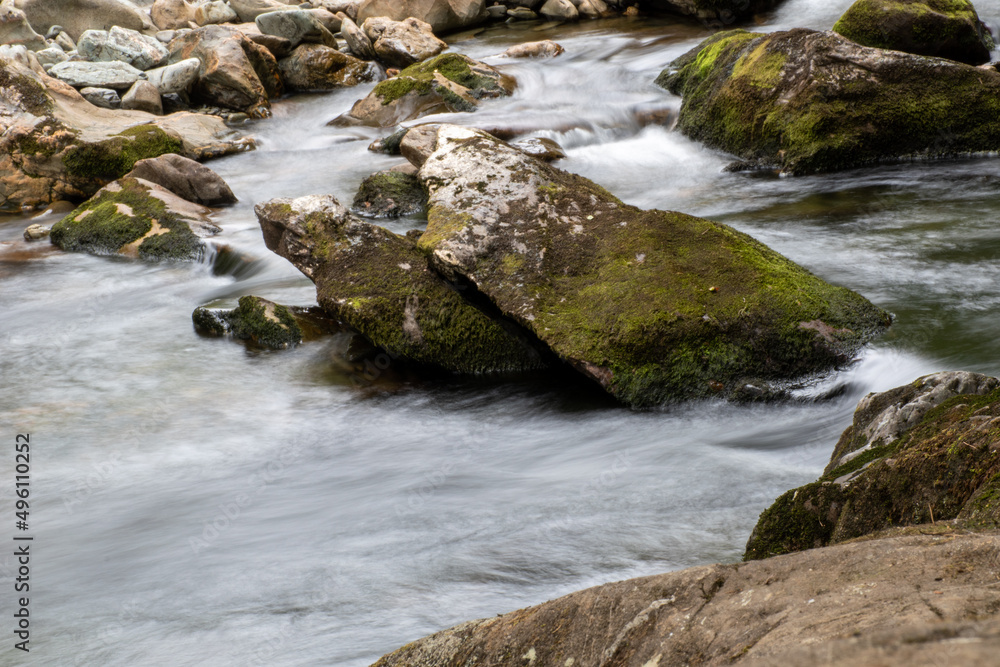 Fast flowing water/waterfalls flowing through the Aberglaslyn Pass near to Beddgelert, in Snowdonia National Park, north Wales