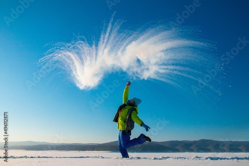 boiling water in the cold, happy woman on a walk in winter,