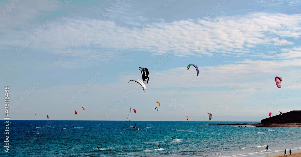 parasailing, coastline on a sunny day, background parasailing, coastline on a sunny day, background