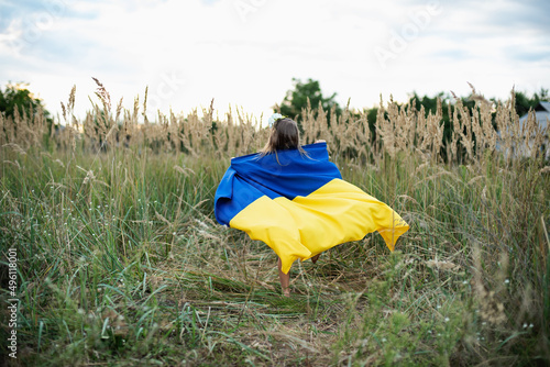 Ukraines Independence Flag Day. Constitution day. Ukrainian child girl with yellow and blue flag of Ukraine. flag symbols of Ukraine. Family  unity  support. Ukrainians are against war.