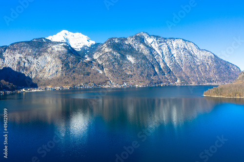 Amazing aerial view of Lake Hallstatt in Austria. The Hallst  tter Lake is one of the most famous lakes in the upper austrian Salzkammergut. Dachstein mountains in the background. Hallstatt  Austria