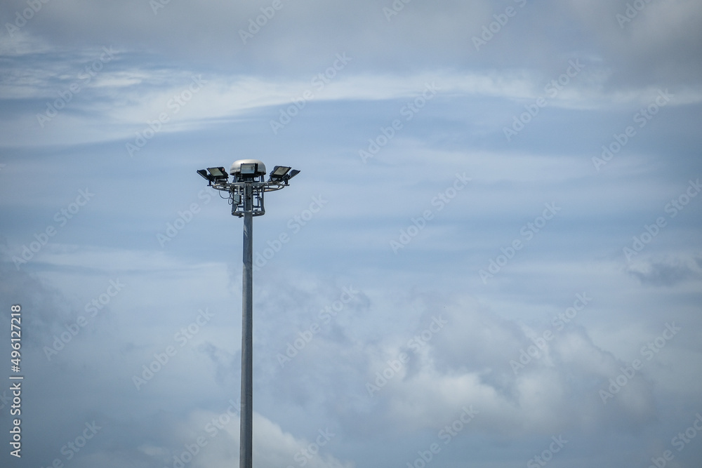 street lamp against blue sky