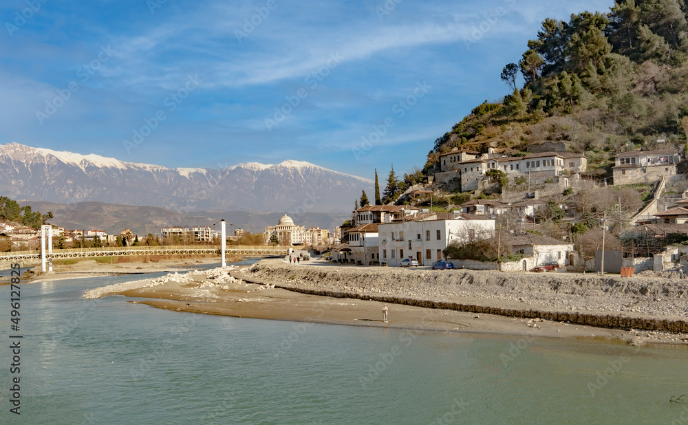 View of the ancient villages in Berat County with snow-covered mountains in the background of this beautiful and popular UNESCO World Heritage site in the Balkan country of Albania. 
