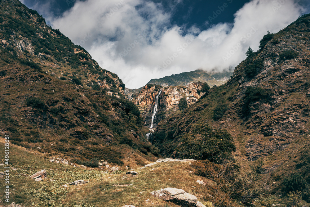 landscape with mountains and waterfall