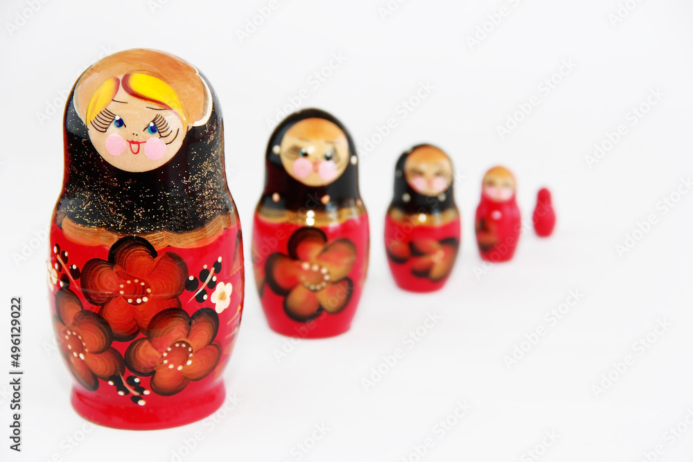 Traditional Russian wooden doll matryoshka with floral pattern