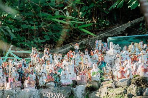 Arry of Many Traditional Chiense God Statues in public area photo