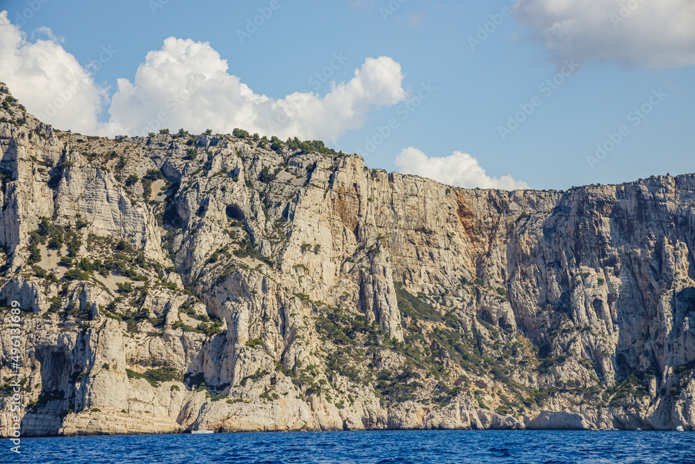 Limestone coast of the Calanques National Park and Mediterranean Sea on a summer day in Provence, France