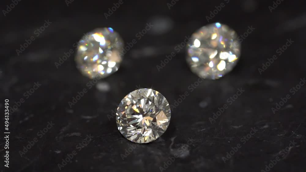 Diamonds sparkle. Diamond shine. 1 carat diamond close-up cinematic. round and oval cut focus on. Diamonds sparkle. Diamond shine. 1 carat diamond close-up cinematic. round and oval cut focus on.