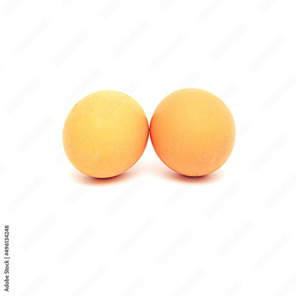 two yellow eggs isolated on white background. two yellow eggs isolated on white background.