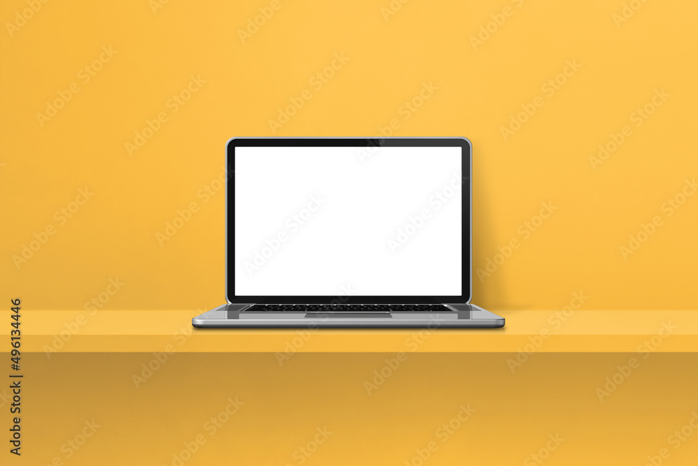 Laptop computer on yellow shelf background Laptop computer on yellow shelf background