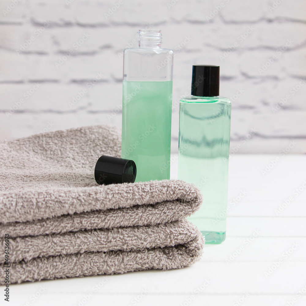 Relax concept beauty products cotton towels square front view. Relax concept beauty products cotton towels square front view.