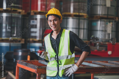 Safety Manager or Engineer checking safety system of machine in factory.