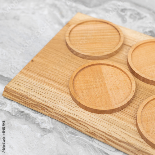 Natural Wooden coasters on the board