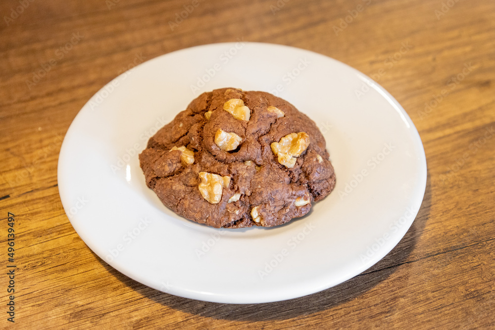 plate with a chocolate chip cookie, restaurant with sweet food, desserts in studio, sugar plate with a chocolate chip cookie, restaurant with sweet food, desserts in studio, sugar
