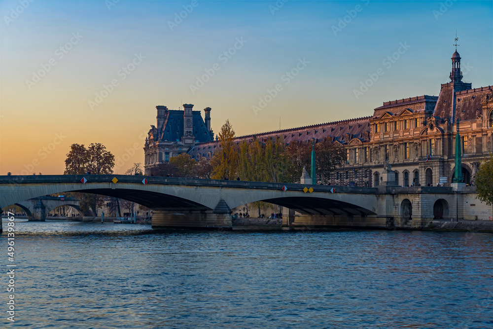 End of Day in Paris Seine River and Bridge Famous Monument Traffic