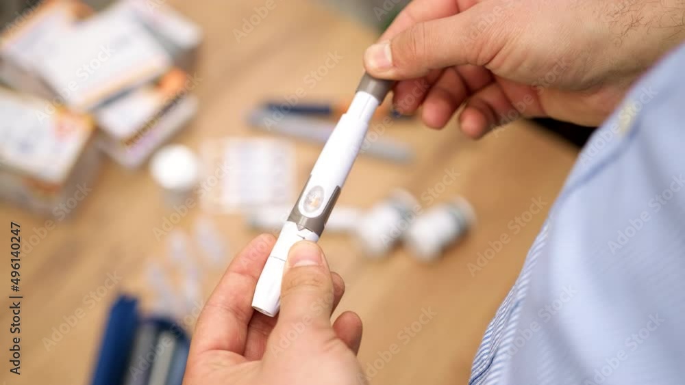 Close up video of man hands holding digital glucose meter, healthcare and medical, diabetes glycemia concept. Close up video of man hands holding digital glucose meter, healthcare and medical, diabetes glycemia concept.