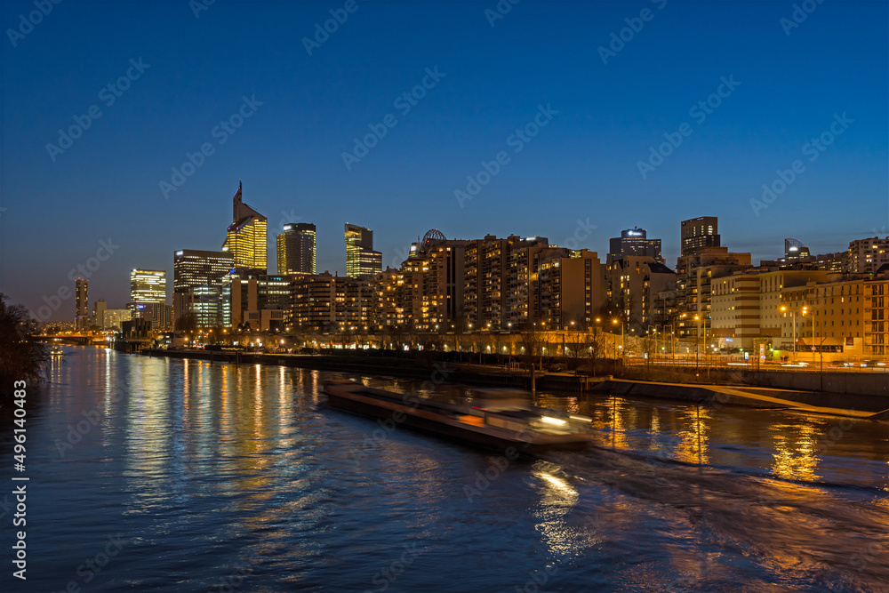 La Defense District at Dusk With Boat on Seine River and Towers