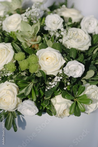 Wedding floral arrangement with white roses.