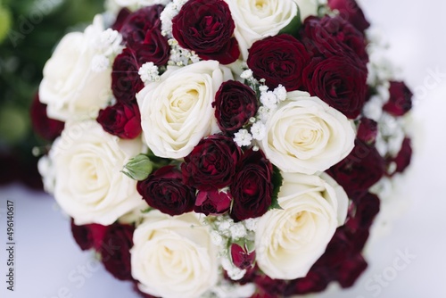 Top view of a wedding floral arrangement with white and red roses.