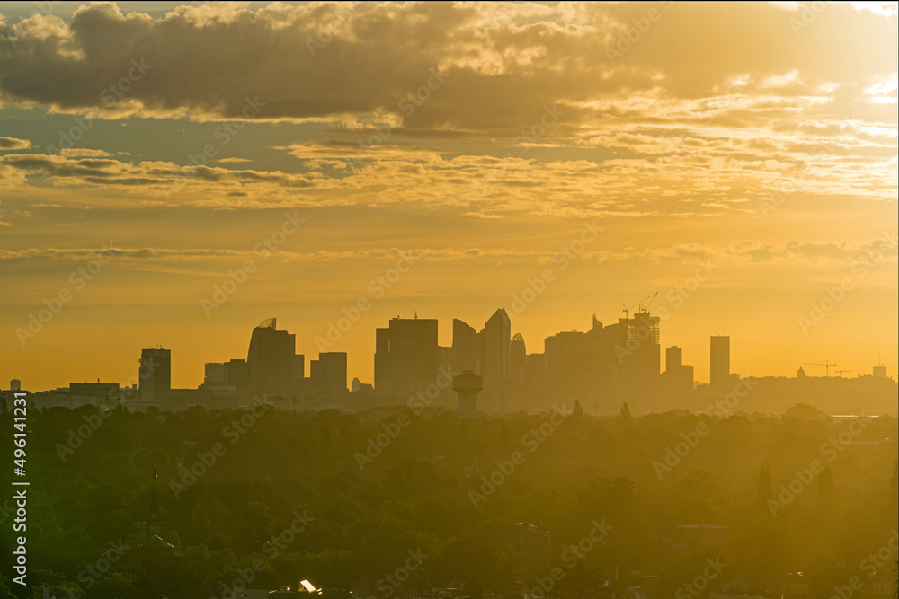 Panorama of La Defense District Skyline at Sunrise With Yellow Sky