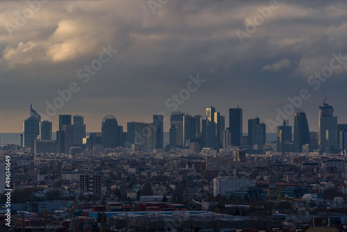 La Defense Business District Under Stormy Clouds With Sunlight on Towers Paris