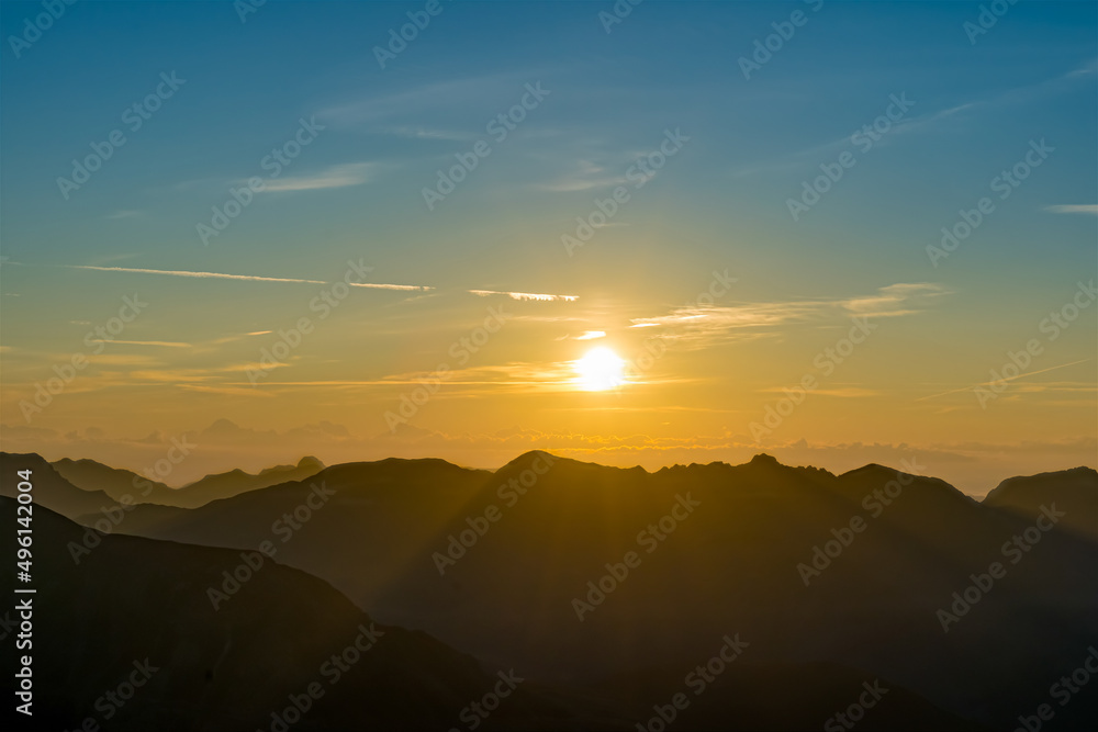 Yellow Sky at Sunrise Over French Alps Silhouette
