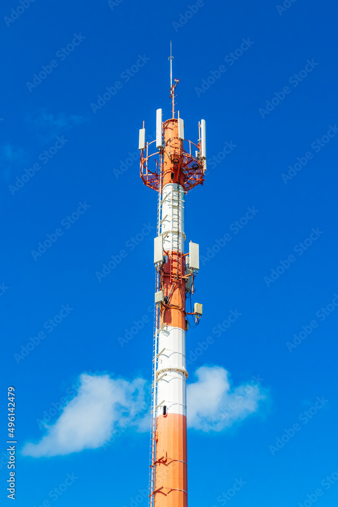 Red white 5G tower radiation in Playa del Carmen Mexico.