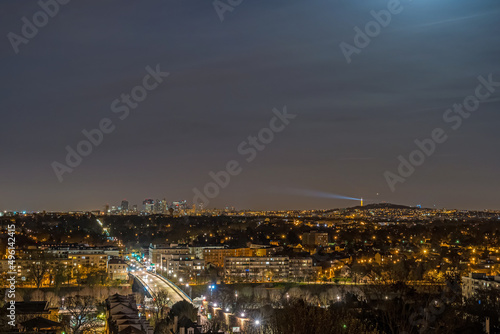 Panorama of La Defense District and Eiffel Tower at Night With Traffic in Paris