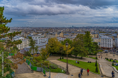 A View of Paris Rooftops From Montmartre Hill Tourists Enjoying the Place