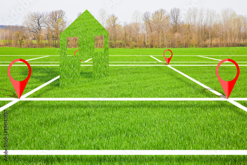 Land plot management - real estate concept with a vacant land on a green field available for building construction with a green home icon