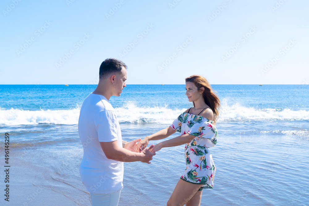 Happy young couple at the sea vacations Happy young couple at the sea vacations