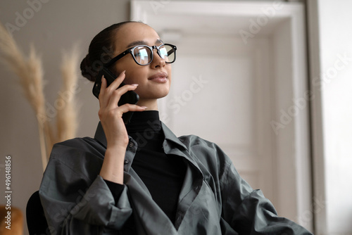 Manager with glasses portrait woman working in office formal stylish clothes