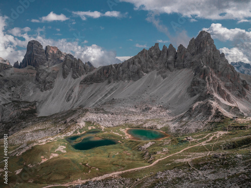 Lakes Lago dei Piani with Paternkofel mountains in the Dolomite Alps in South Tyrol during summer with blue sky from above, Italy.