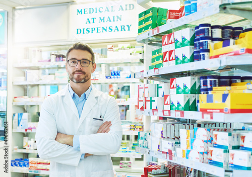 Hes the medication specialist. Portrait of a confident mature pharmacist working in a pharmacy.