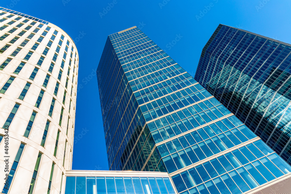 Newly developed towers of modernistic office and hotel complex at Towarowa street in booming Wola business district of city center in Warsaw, Poland Newly developed towers of modernistic office and hotel complex at Towarowa street in booming Wola business district of city center in Warsaw, Poland