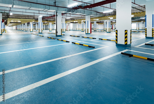 Empty underground parking lot in modern building