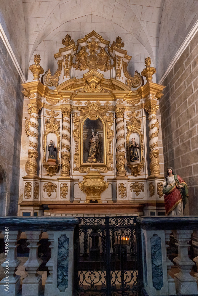 view of one of the ornate side altars in the Church of San Francisco in Evora