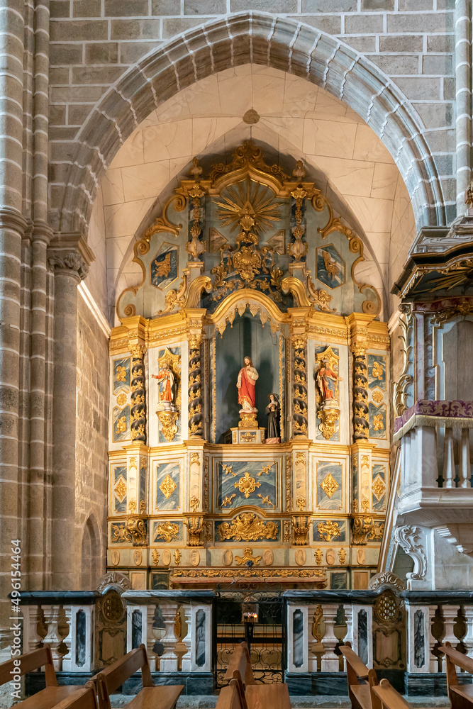 view of one of the ornate side altars in the Church of San Francisco in Evora