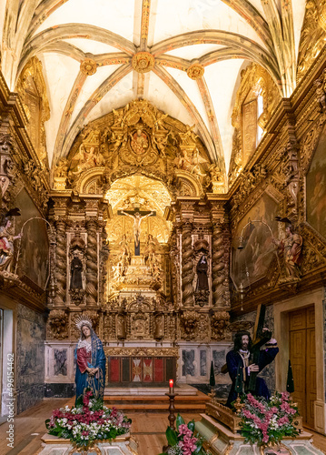 view of one of the ornate side altars in the Church of San Francisco in Evora