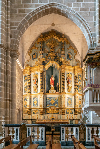 view of one of the ornate side altars in the Church of San Francisco in Evora © makasana photo