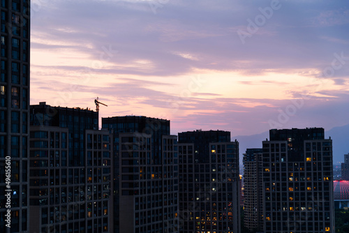 Modern skyscrapers in the city at dusk