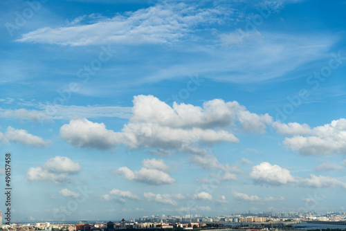 The city under cloud blue sky