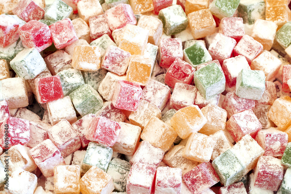 Fruit paste sugar covered candy background, different colors Fruit paste sugar covered candy background, different colors