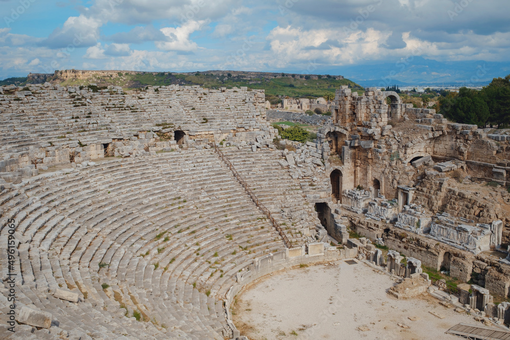walk in Antalya Turkey on warm October afternoon, city Perge the Ancient theater. one of Pamphylian cities and was believed to have been built in the 12th to 13th centuries BC.