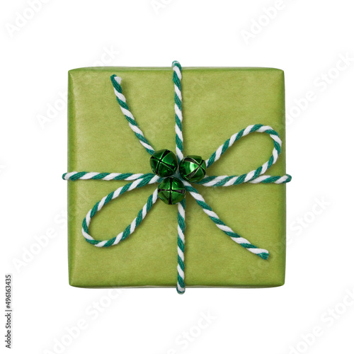 Christmas present box wrapped in light green paper with baker’s twine bow isolated on white background