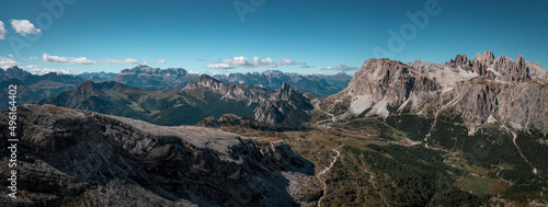Mountain panorama at Passo di Falzarego during sunny blue sky day in the Dolomite Alps, South Tyrol Italy.