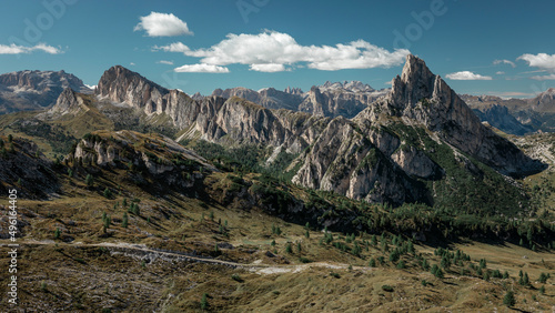 Mountain summit of Hexenstein at Passo di Falzarego during sunny blue sky day in the Dolomite Alps, South Tyrol Italy. photo