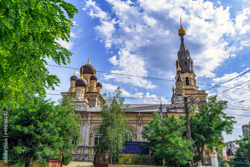 Side view of the Cathedral of Our Lady Mother of Kasperovskaya in Mykolaiv, Ukraine. Beautiful architecture of the Ukrainian Orthodox Church photo