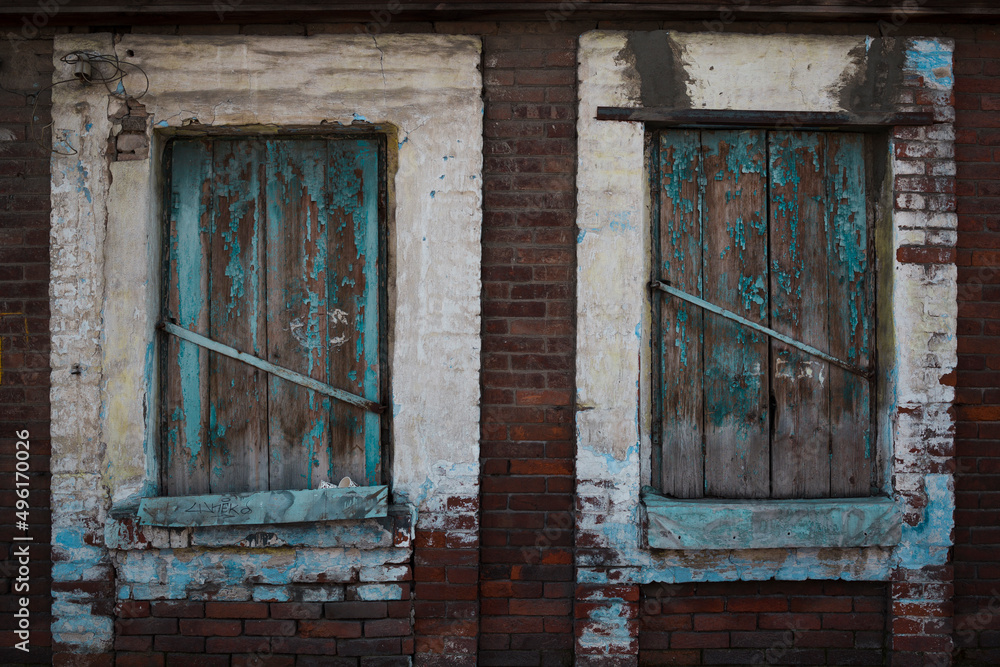 Two wooden windows in abandoned old countryside house. Two wooden windows in abandoned old countryside house.